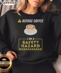 Funny coffee addict sweatshirt with 'Good Before Coffee I Am A Safety Hazard' slogan, perfect for coffee lovers.