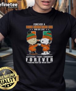 Good Charlie Brown fist bump with Snoopy, Miami Hurricanes fan T-shirt, win or lose, shows team spirit and loyalty.