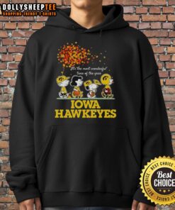 Good Charlie Brown, Sally Brown, Snoopy, and Woodstock in Iowa Hawkeyes hoodie, celebrating 'It's the Most Wonderful Time of the Year'.