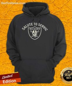Pete Carroll wearing a Las Vegas Raiders NFL Salute to Service logo hoodie, showcasing team spirit and support for veterans.