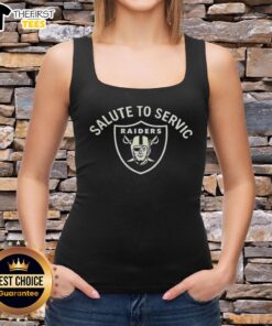 Pete Carroll in a Las Vegas Raiders tank top featuring the NFL Salute to Service logo, celebrating coaching excellence.
