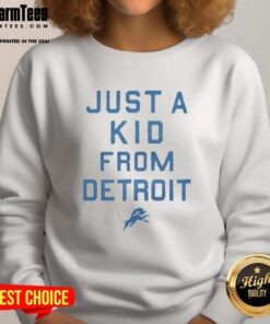 Alt Text: Kid wearing a 'Just A Kid From Detroit' sweatshirt, supporting the Detroit Lions in a vibrant urban setting.