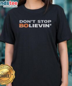 Alt Text: Ladies Denver Broncos football tee with 'Don't Stop Believin' design, perfect for fans and game day wear.