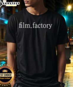 Alt Text: Gael Garca Bernal smiling while wearing a Film Factory T-shirt, showcasing his casual style and passion for film.