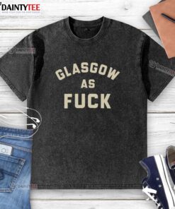Good Glasgow As F*ck washed t-shirt displayed on a hanger, showcasing its trendy design and soft fabric.