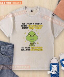 Good Grinch We Live In A World Where The Intelligent Must Keep Quiet washed t-shirt featuring a creative, eye-catching design.