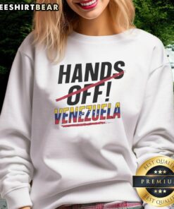 Red line sweatshirt featuring 'Good Hands Off Venezuela' design, perfect for supporters of Venezuelan freedom and activism.
