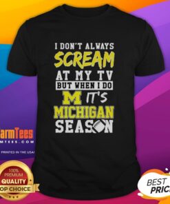 Alt Text: Michigan Wolverines NCAA football lover t-shirt with humorous slogan about shouting at the TV during games.