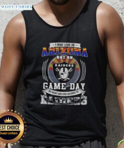 Arizona football fan wearing a Las Vegas Raiders tank top, showcasing team spirit on game day.