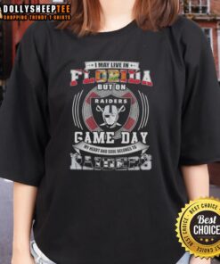 Florida football fan wearing a Raiders tee, showcasing love for Las Vegas Raiders on game day. Womens sports apparel.