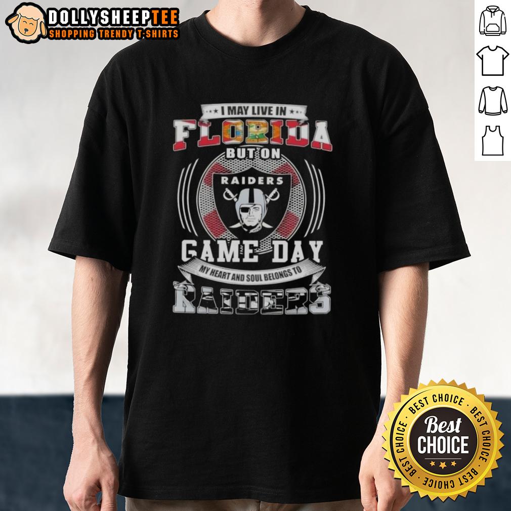 Good I May Live In Florida But On Game Day My Heart And Soul Belongs To Las Vegas Raiders Football T-Shirt Alt Text: Florida fan wearing a Las Vegas Raiders football t-shirt, showcasing team spirit on game day.