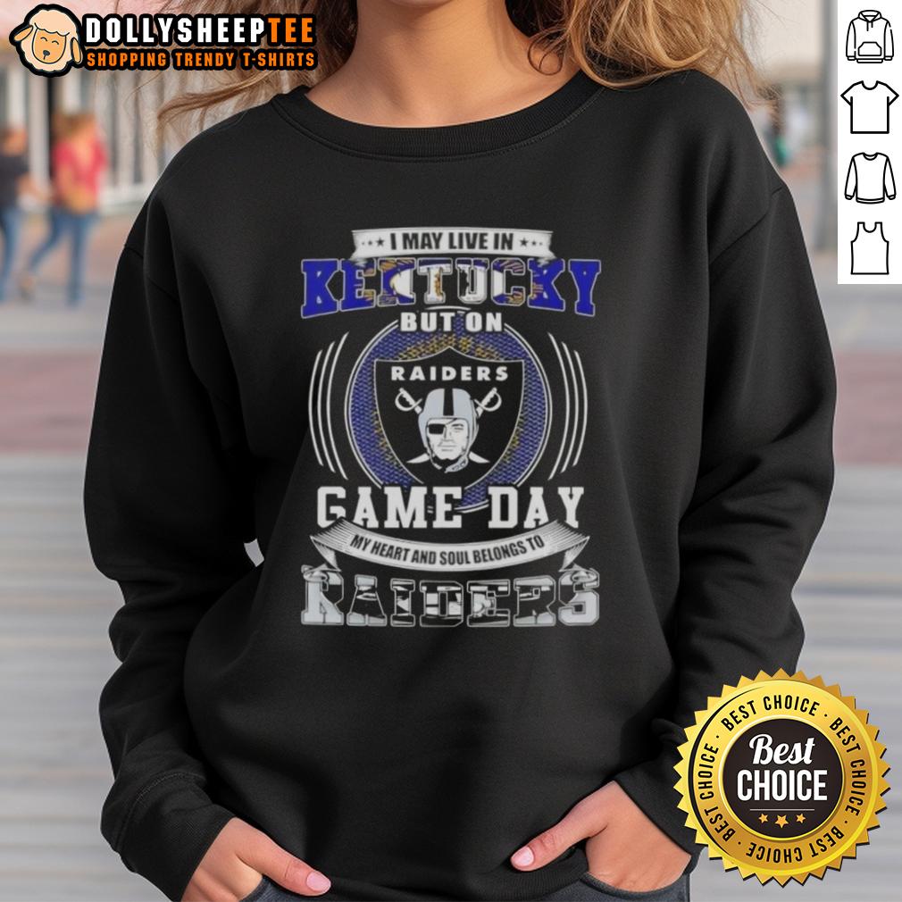 Good I May Live In Kentucky But On Game Day My Heart And Soul Belongs To Las Vegas Raiders Football Sweatshirt Kentucky fan wearing a Las Vegas Raiders football sweatshirt on game day, showcasing team pride and spirit.