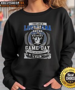Alt Text: Comfortable sweatshirt featuring 'Good I May Live In Louisiana But On Game Day My Heart Belongs To Raiders' design.