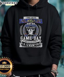 Alt Text: Person wearing a Las Vegas Raiders football hoodie, showcasing team spirit while living in Pennsylvania on game day.