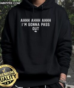 Man wearing a Nebraska Cornhuskers hoodie, looking exhausted, captioned 'Good, I'm gonna pass out' in a cozy setting.