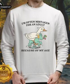 Cozy 'Good I'm Often Mistaken for an Adult Because of My Age' goose sweatshirt in a casual setting, perfect for humorous fashion.