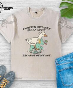Good I'm Often Mistaken For An Adult Because Of My Age Goose washed t-shirt featuring a playful graphic design.
