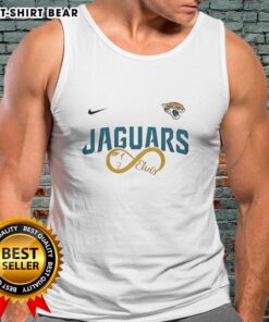 Fan wearing a Jacksonville Jaguars NFL tank top featuring Elvis Presley design, celebrating team spirit and music.