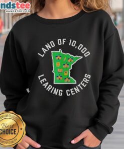 Good Land of 10,000 Learning Centers sweatshirt featuring vibrant design, perfect for promoting education and community.