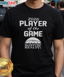 Alt Text: Good Mcinturf Realty 2026 Player Of The Game T-Shirt featuring bold graphics and vibrant colors for sports fans.