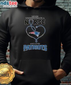 Alt Text: Nurse in a New England Patriots hoodie, showcasing love for football and dedication to healthcare.