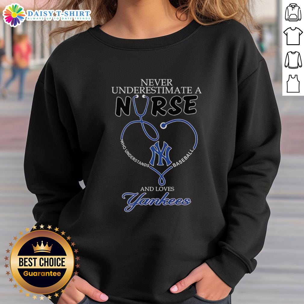 Good Never Underestimate A Nurse Who Understands Baseball And Loves New York Yankees Stethoscope Heart Sweatshirt Alt Text: Nurse sweatshirt featuring a stethoscope and heart with New York Yankees theme, perfect for baseball-loving healthcare workers.