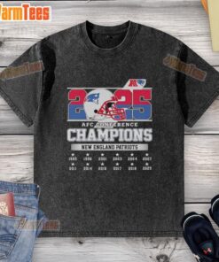 Alt Text: New England Patriots 2025 AFC Conference Champions helmet graphic on a washed t-shirt, perfect for fans.
