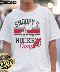 Good New Jersey Devils Snoopy's Hockey Camps 2026 T-Shirt featuring vibrant graphics and team colors for young fans.