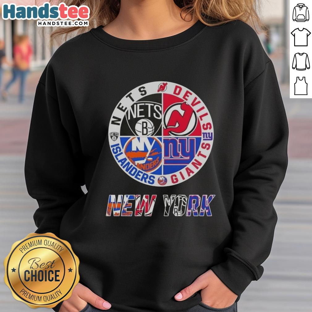 good-new-york-city-sports-nets-devils-giants-islanders-logos-combine-sweatshirt Alt Text: Good New York City Sports sweatshirt featuring logos of Nets, Devils, Giants, and Islanders for fans.