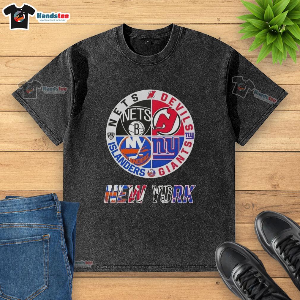 good-new-york-city-sports-nets-devils-giants-islanders-logos-combine-washed-t-shirt Alt Text: Good New York City sports logos on a washed t-shirt featuring Nets, Devils, Giants, and Islanders designs.