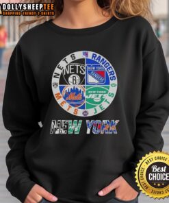 Alt Text: Good New York City sports sweatshirt featuring logos of Nets, Rangers, Jets, and Mets for fans.