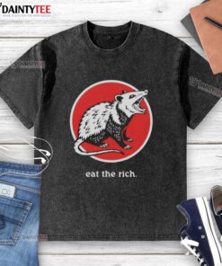 Funny 'Eat The Rich' opossum graphic on a washed t-shirt, perfect for casual wear and humor lovers.
