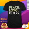 Good Peace Love Dogs T-Shirt featuring a playful design with a heart, peace sign, and dog illustrations in vibrant colors.