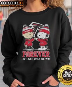 Alt Text: Good Peanut Snoopy and Charlie Brown Atlanta Falcons sweatshirt celebrating fandom, 'Forever Not Just When We Win'.
