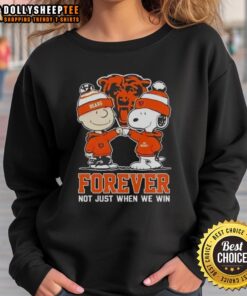 Good Peanut Snoopy and Charlie Brown Chicago Bears sweatshirt, celebrating fandom with 'Forever, Not Just When We Win' slogan.
