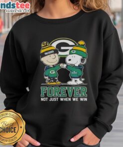 Good Peanut Snoopy and Charlie Brown Green Bay Packers sweatshirt, celebrating team spirit: 'Forever Not Just When We Win.'
