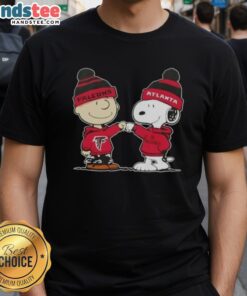 Good Peanuts Charlie Brown and Snoopy fist bump on Atlanta Falcons football T-shirt design, perfect for fans.