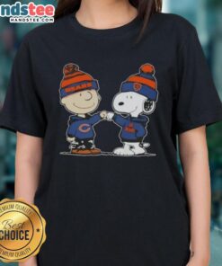 Good Peanuts Charlie Brown fist bump with Snoopy, featuring Chicago Bears football design on a ladies tee.