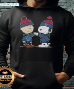 Charlie Brown and Snoopy fist bump in Houston Texans football hoodie, showcasing fun Good Peanuts collaboration.