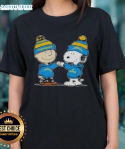 Charlie Brown fist bumps Snoopy in a Good Peanuts tee, showcasing Los Angeles Chargers football spirit for ladies.