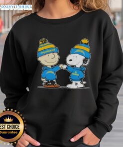 Alt Text: Charlie Brown and Snoopy fist bump in Los Angeles Chargers football sweatshirt, celebrating good vibes with peanuts.