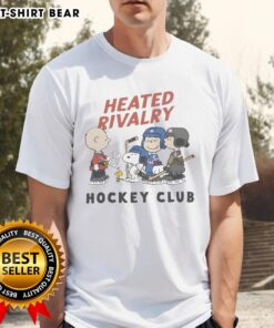 Good Peanuts Heated Rivalry Hockey Club graphic T-shirt featuring playful hockey-themed design and vibrant colors.
