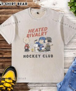 Alt Text: Good Peanuts Heated Rivalry Hockey Club graphic washed t-shirt featuring a bold design and comfortable fit.