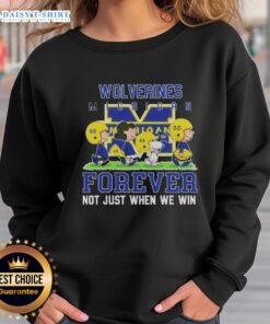 Michigan Wolverines Forever sweatshirt with 'Good Peanuts' design, perfect for fans, celebrating team spirit and loyalty.