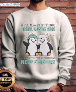 Cozy sweatshirt featuring penguins and the phrase about friendship, perfect for penguin lovers and casual wear.
