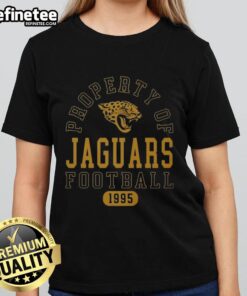 Jacksonville Jaguars ladies tee featuring 'Good Property' design, perfect for fans since 1995. Stylish and comfortable.