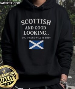 Man wearing a stylish 'Good Scottish and Good Looking Oh Where Will It End Hoodie' outdoors, showcasing Scottish fashion.