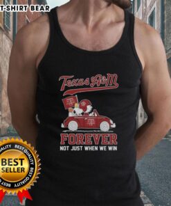 Good Snoopy and Charlie Brown driving car in Texas A&M Aggies tank top, celebrating teamwork and spirit, not just winning.