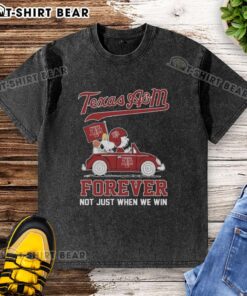 Alt Text: Good Snoopy and Charlie Brown Peanuts driving car graphic on Texas A&M Aggies washed t-shirt, perfect for fans.