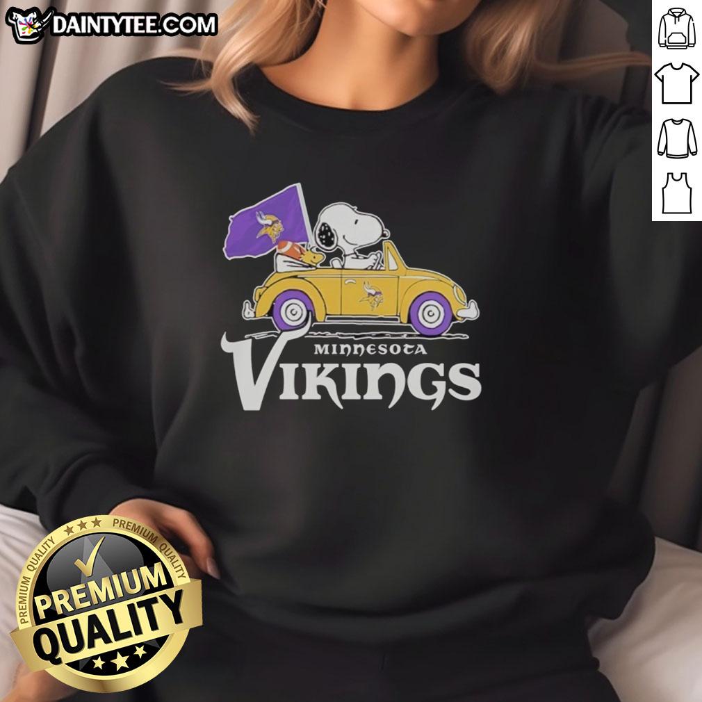 good-snoopy-and-woodstock-riding-minnesota-vikings-football-car-logo-sweatshirt Alt Text: Good Snoopy and Woodstock riding in a Minnesota Vikings football car logo sweatshirt, showcasing team spirit.
